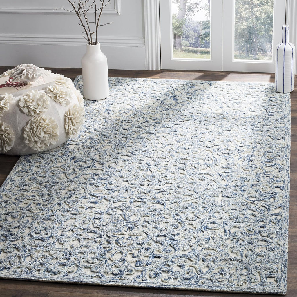 SAFAVIEH Trace Collection Area Rug - 9' x 12', Blue & Ivory, Handmade Wool, Ideal for High Traffic Areas in Living Room, Bedroom (TRC103B)