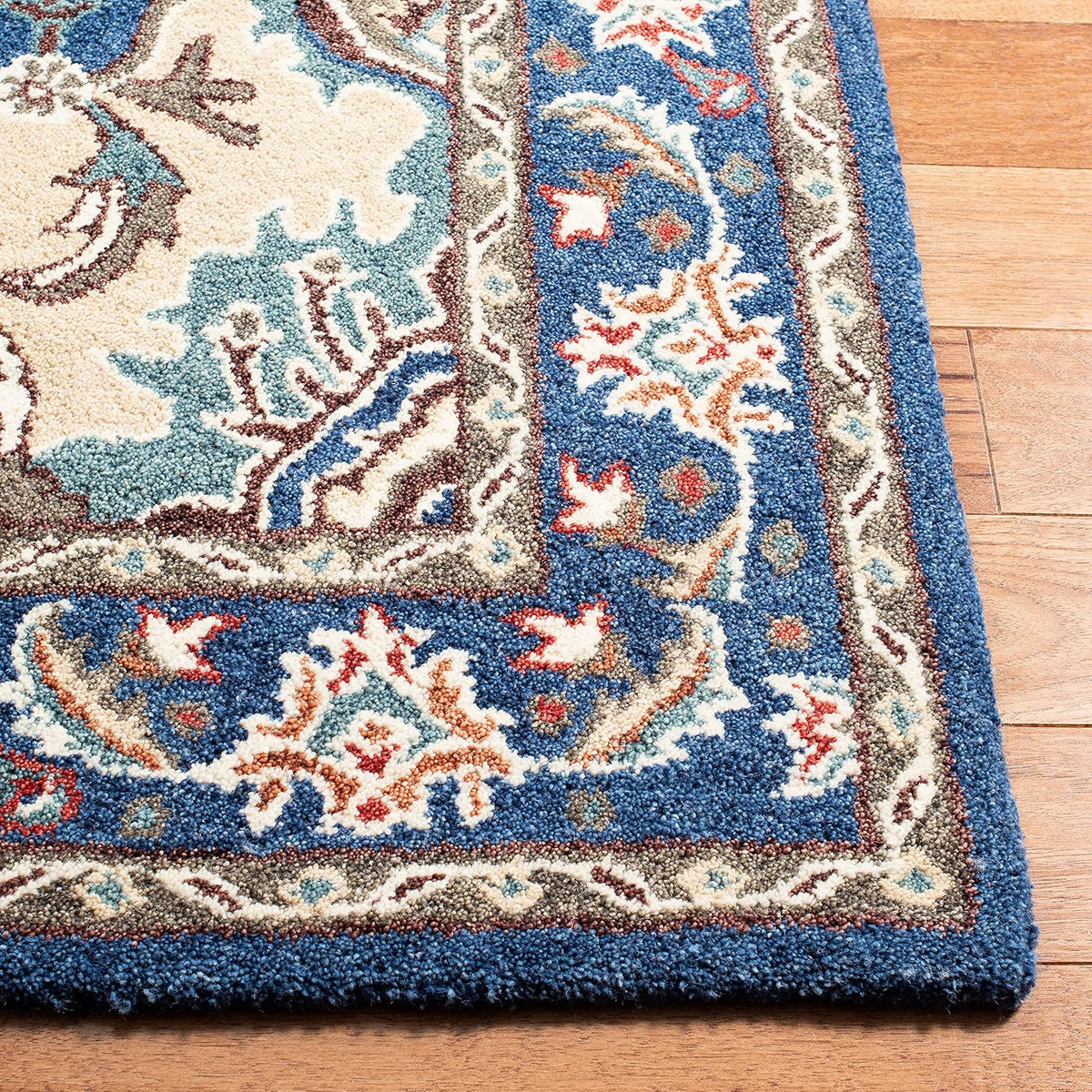 SAFAVIEH Area Rug 8x10 - Antiquity Collection - Large - Blue & Ivory, Handmade Wool, Traditional Design, Ideal for Living Room, Bedroom, Office, Dining Space (AT520M)
