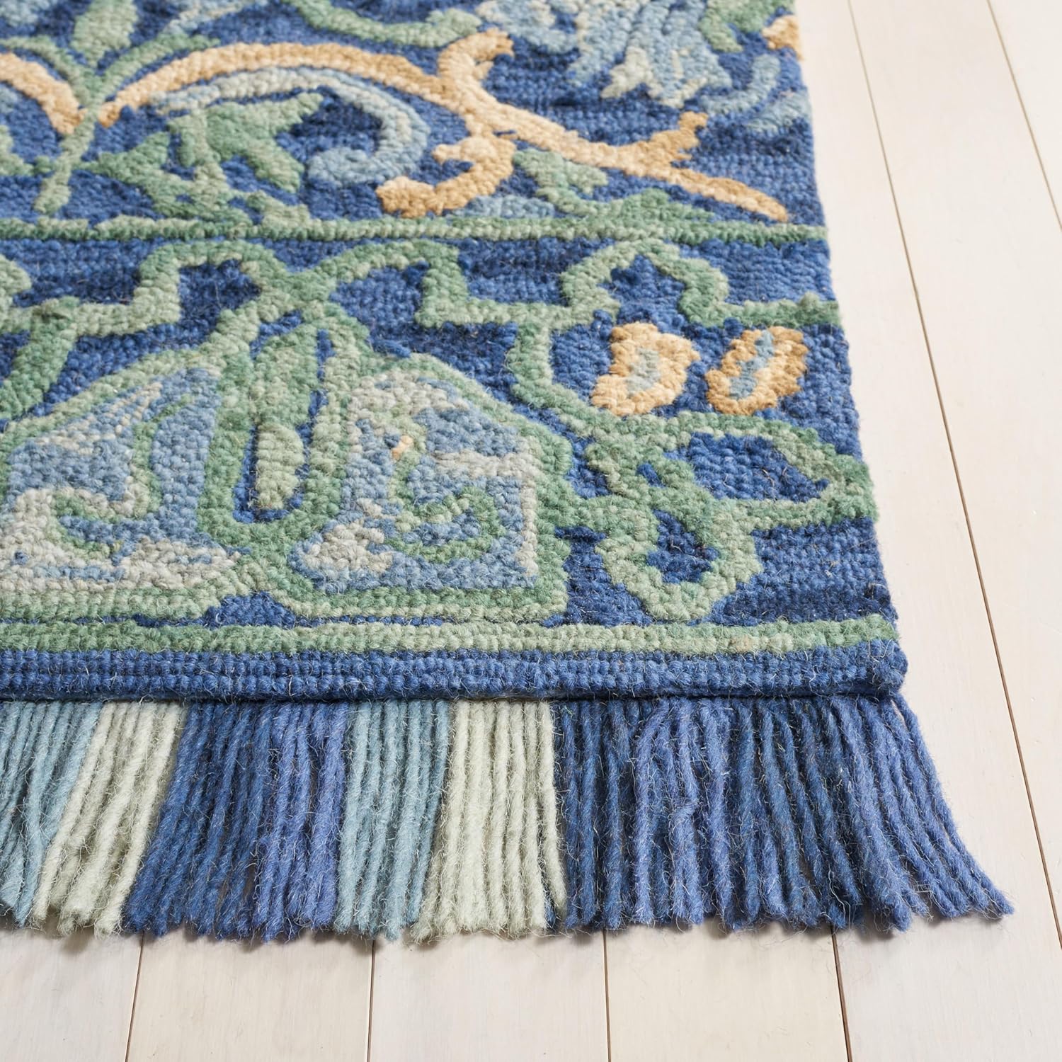 SAFAVIEH Blossom Collection Area Rug - 9' x 12', Navy & Green, Handmade Boho Fringe Wool, Ideal for High Traffic Areas in Living Room, Bedroom (BLM422A)