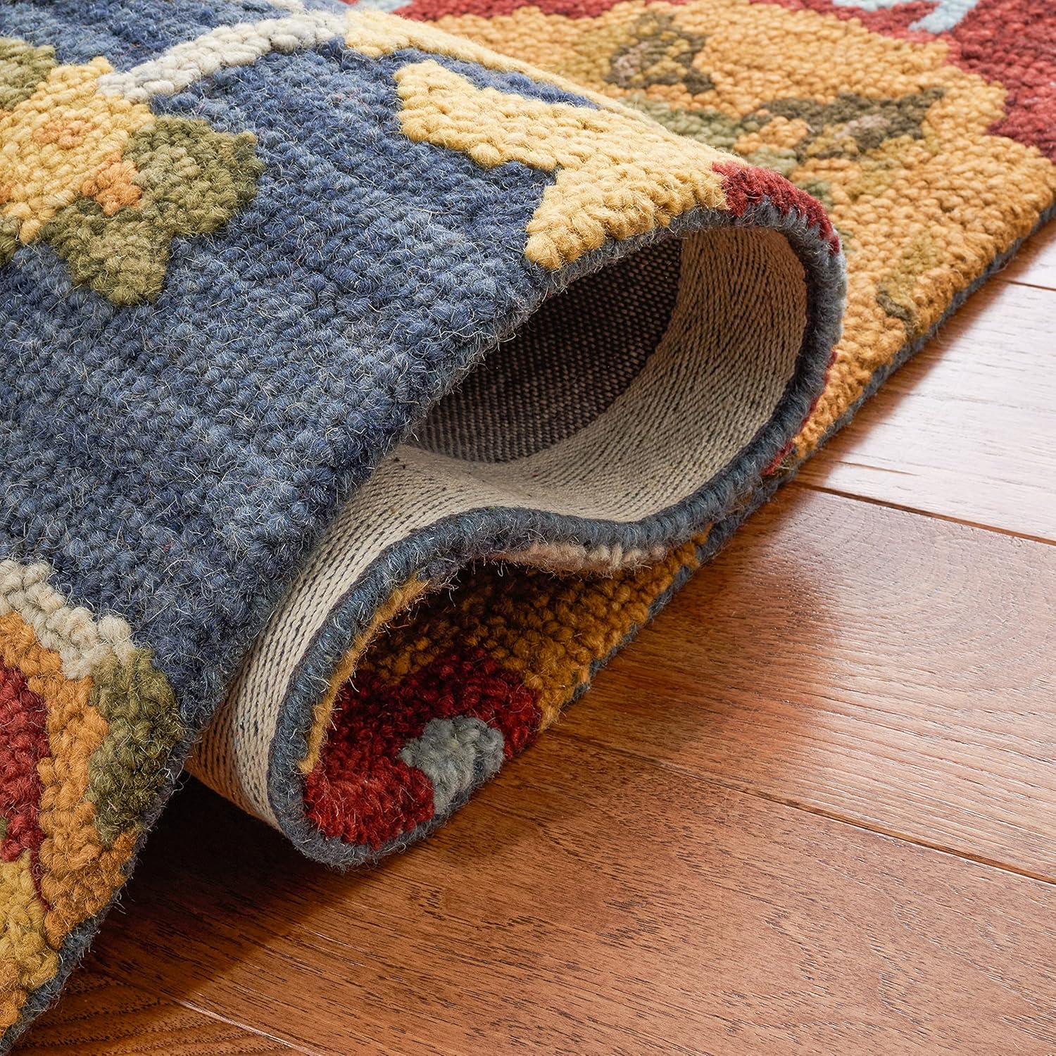 SAFAVIEH Blossom Collection Area Rug - 9' x 12', Navy & Multi, Handmade Wool, Ideal for High Traffic Areas in Living Room, Bedroom (BLM401N)