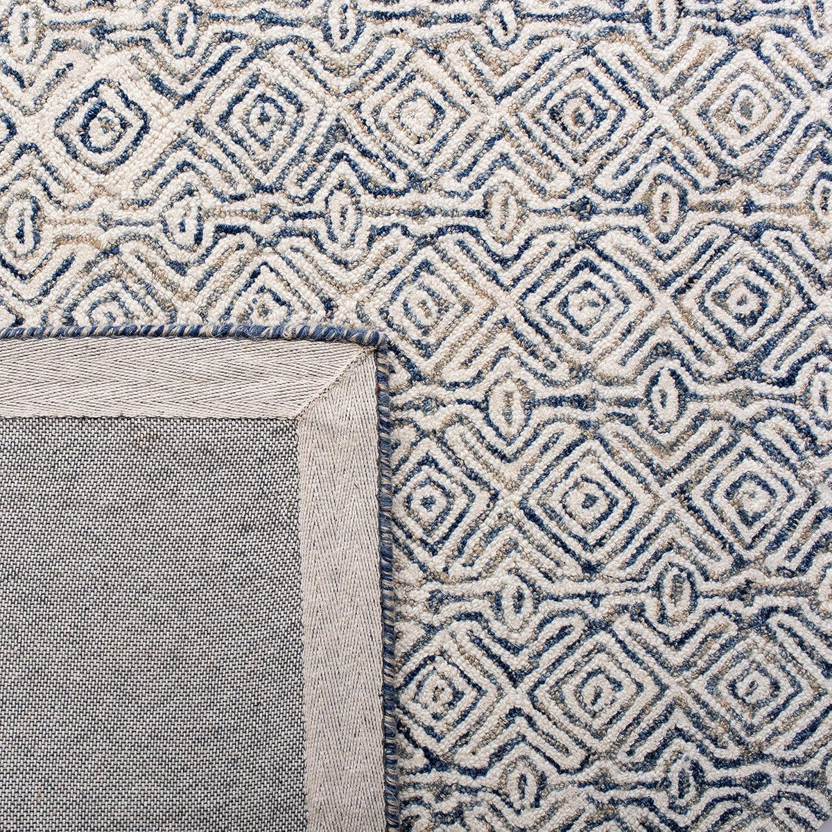 SAFAVIEH Micro-Loop Collection Area Rug - 9' x 12', Navy & Ivory, Handmade Wool, Ideal for High Traffic Areas in Living Room, Bedroom (MLP526N)