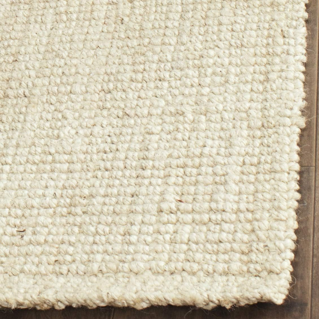 SAFAVIEH Natural Fiber Collection Area Rug - 9' x 12', Ivory, Handmade Farmhouse Jute, Ideal for High Traffic Areas in Living Room, Bedroom (NF730A)