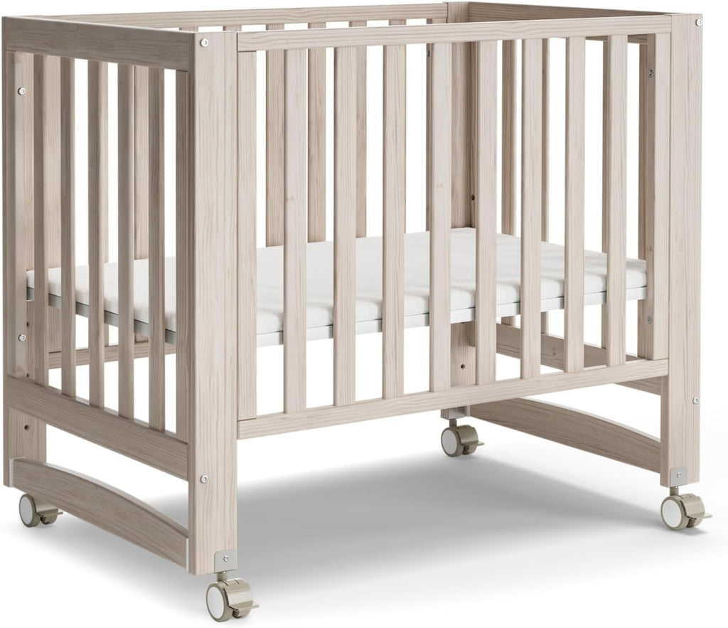 MAMAZING EvoNest Baby Crib, 3 in 1 Convertible Mini Crib with Wheels, 100% New Zealand Wood Crib, 4 Adjustable Mattress Height, GREENGUARD Gold Certified, Washed Natural