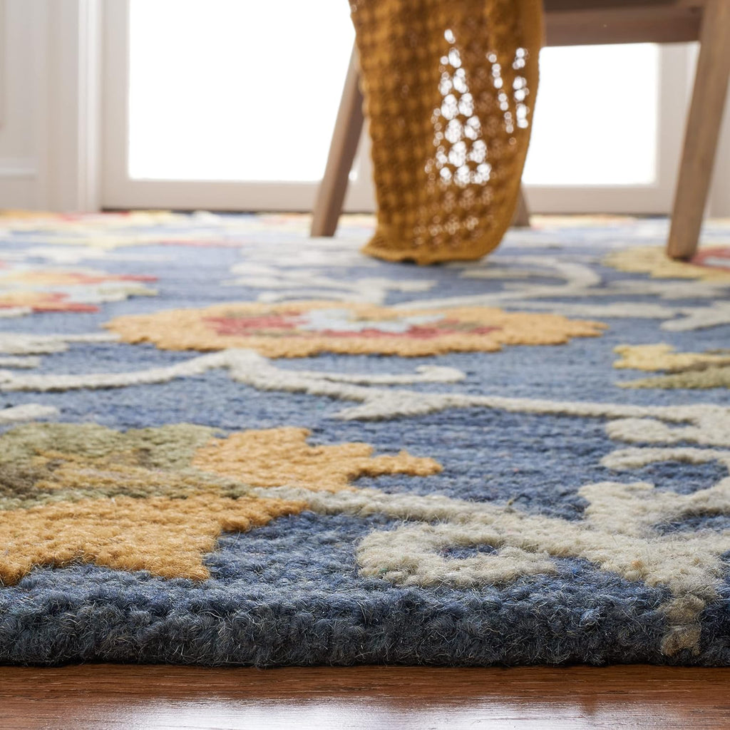 SAFAVIEH Blossom Collection Area Rug - 9' x 12', Navy & Multi, Handmade Wool, Ideal for High Traffic Areas in Living Room, Bedroom (BLM401N)