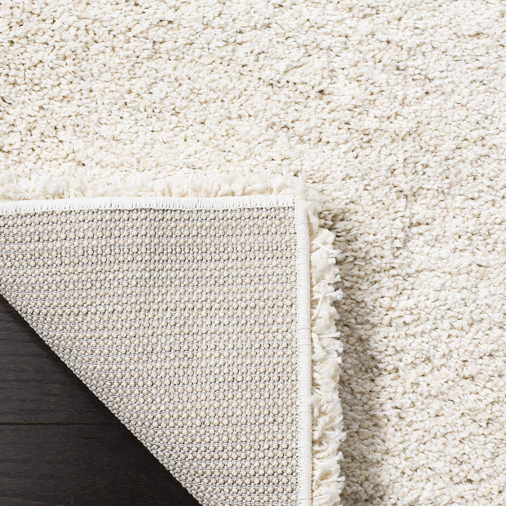 SAFAVIEH Milan Shag Collection Area Rug - 8' x 10', Ivory, Solid Design, Non-Shedding & Easy to Clean, Plush Thick Pile, Ideal for Living Room, Bedroom (SG180-1212)