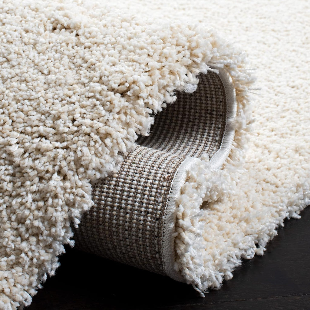 SAFAVIEH Milan Shag Collection Area Rug - 8' x 10', Ivory, Solid Design, Non-Shedding & Easy to Clean, Plush Thick Pile, Ideal for Living Room, Bedroom (SG180-1212)