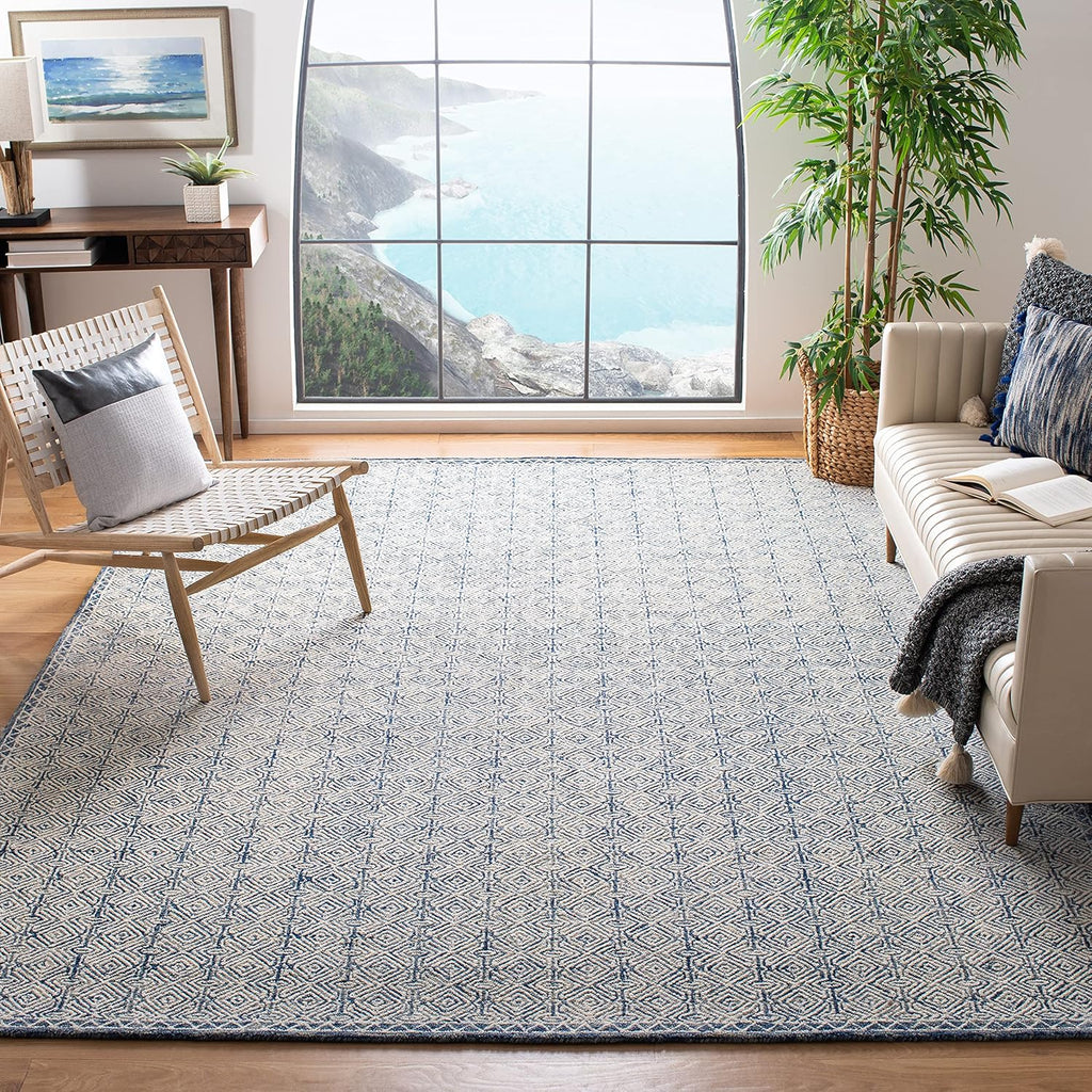 SAFAVIEH Micro-Loop Collection Area Rug - 9' x 12', Navy & Ivory, Handmade Wool, Ideal for High Traffic Areas in Living Room, Bedroom (MLP526N)