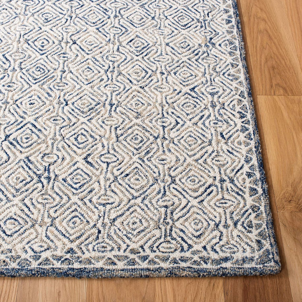 SAFAVIEH Micro-Loop Collection Area Rug - 9' x 12', Navy & Ivory, Handmade Wool, Ideal for High Traffic Areas in Living Room, Bedroom (MLP526N)