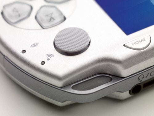 Sony PSP Playstation Portable 2000 Slim and Lite- Ice Silver (Renewed)