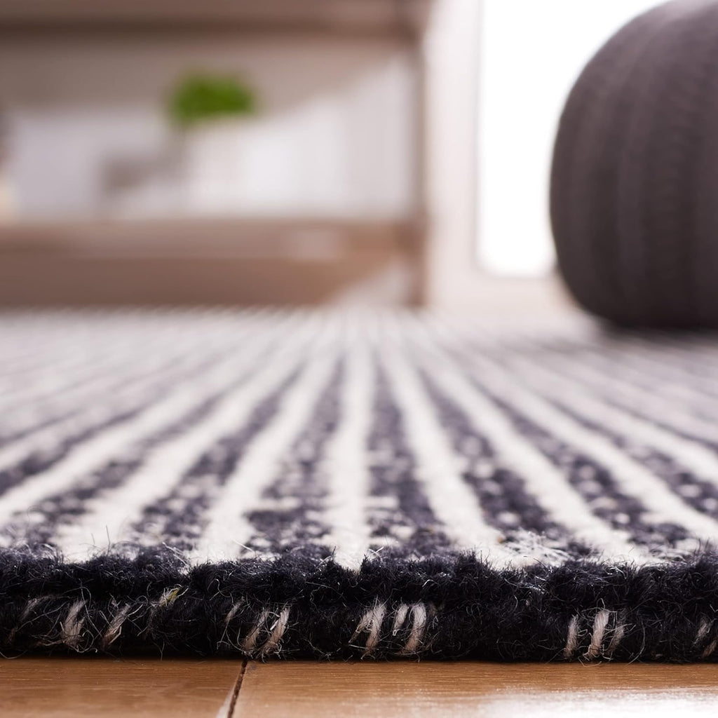 SAFAVIEH Area Rug 8x10 - Abstract Collection - Large - Black & Ivory, Handmade Wool, Ideal for Living Room, Bedroom, Office, Dining Space (ABT482Z)