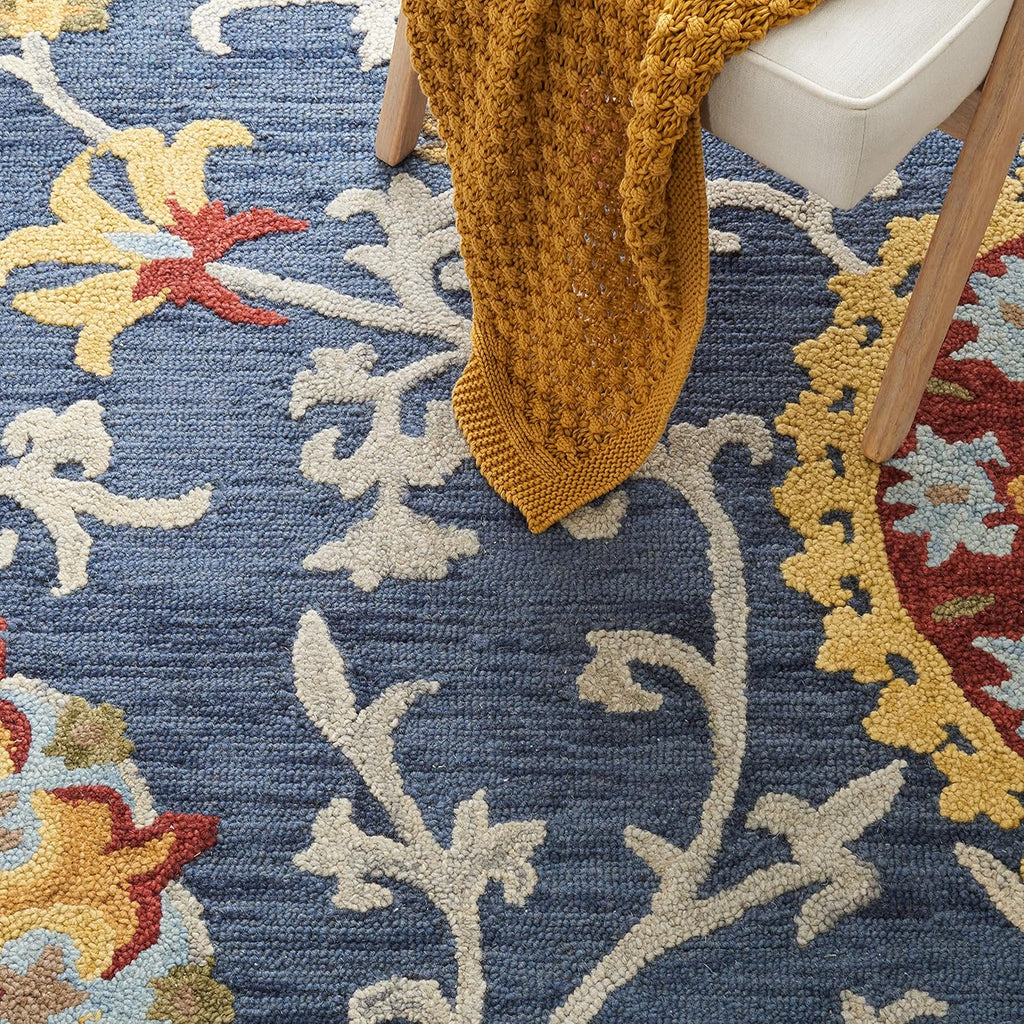 SAFAVIEH Blossom Collection Area Rug - 9' x 12', Navy & Multi, Handmade Wool, Ideal for High Traffic Areas in Living Room, Bedroom (BLM401N)